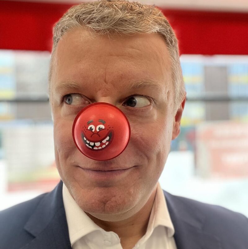 Luke wearing a Comic Relief red nose